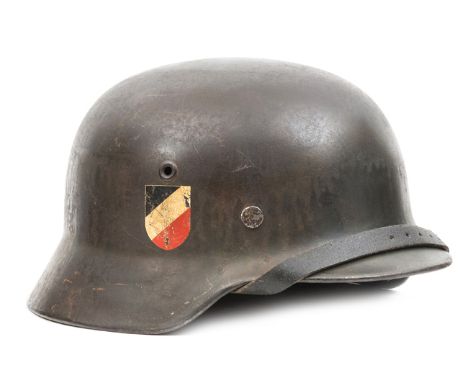 A Third Reich M40 double decal Army helmet,  dark grey/green with tricolour and Army eagle decals, by ET (Eisenhuttenwerke, T