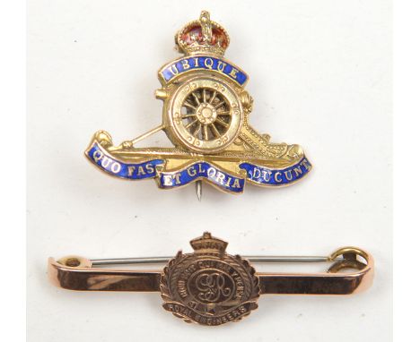 An enamelled gold “sweetheart” badge of The R Artillery,  well detailed cannon, marked “9ct Gold”, pin fitting, and an engrav