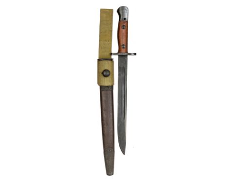 A WWII Australian P1907 SMLE bayonet, shortened blackened blade 10”, marked “XOA” with broad arrow at forte, grips marked “Sl