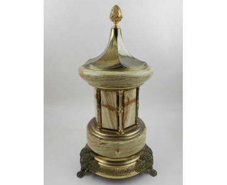 A collection of onyx items, to include a gilt metal mounted cigarette dispenser, a mantle clock, ashtrays, garnitures etc.