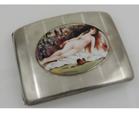 A silver calling card case, having engine turned design, and applied enamel plaque depicting a sleeping maiden. 
