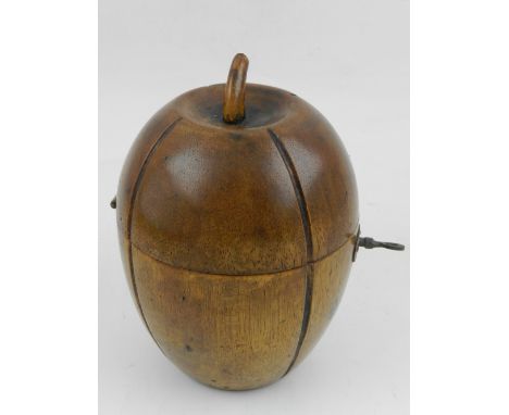 A fruitwood tea caddy in the form of a melon. 