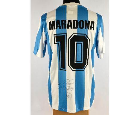 Diego Maradona Back Signed Argentina 1986 Home Shirt, in presentation box along with Icons.com Certificate of Authenticity. 