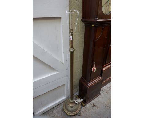 An old brass reeded column standard lamp, height adjustable.&nbsp; &nbsp; 