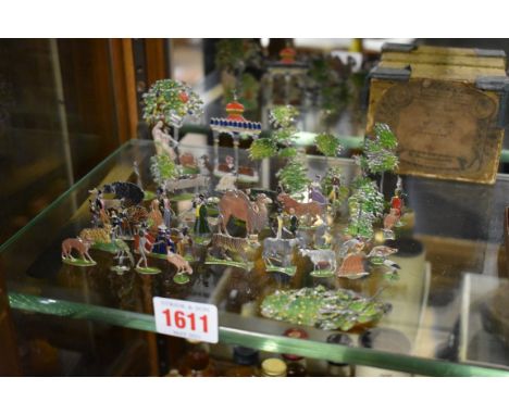 A collection of vintage Heinrichsen lead flats, comprising:&nbsp;figures, animals and scenery, to include Adam &amp; Eve, 6.5