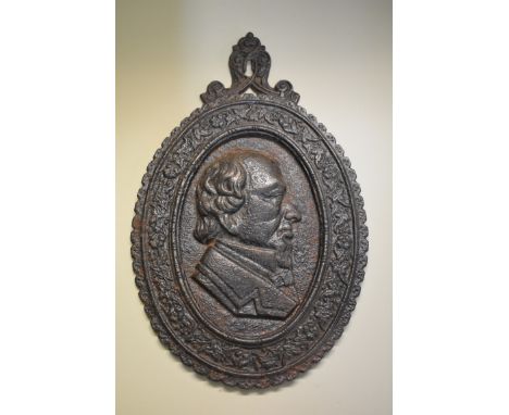 A Victorian cast iron portrait relief plaque of Charles Dickens,&nbsp;30cm high.&nbsp; 