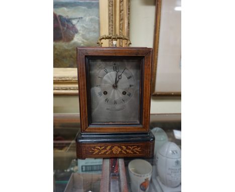 A 19th century French rosewood and inlaid library type clock,&nbsp;with finely engine turned silvered dial, the movement insc