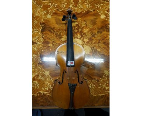 An antique continental violin,&nbsp;labelled 'Antonius Stradivarius', with 14in two piece 'flame' back, with bow and case. 