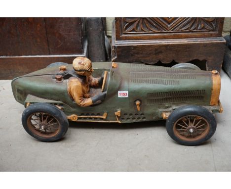 A painted model of a vintage racing car, 70.5cm long.&nbsp; 