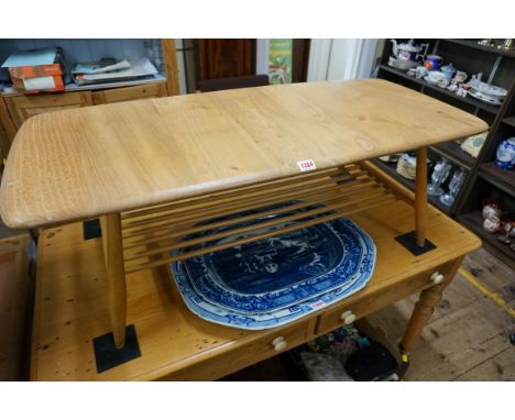 A vintage Ercol blonde coffee table, 104cm wide. 