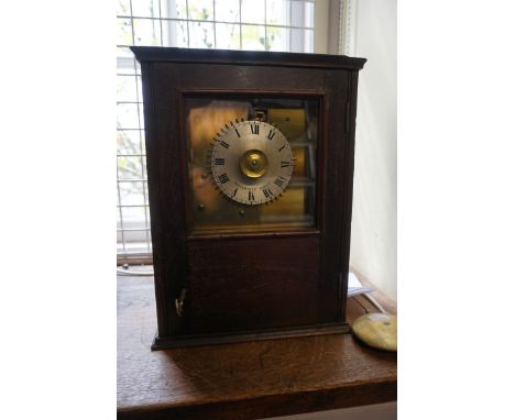 Of Royal Interest:&nbsp;a rare late 18th/early 19th century oak noctuary or night watchman's clock, the silvered chapter ring