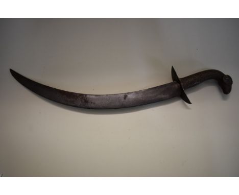 A Persian dagger, having curved 37cm blade and stylized goat's head pommel. 