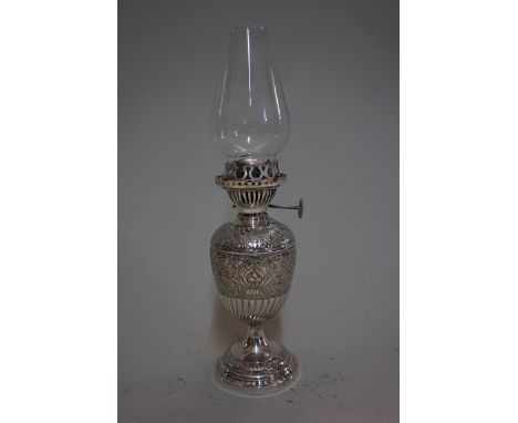 A small electroplated oil lamp,&nbsp;by Walker &amp; Hall, height including chimney 29cm.&nbsp; 