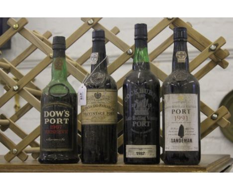 A Sandeman late bottled vintage port, 1991, a Dow's port 1967 reserve and a Cockburns late bottled vintage port 1987 and a Fo