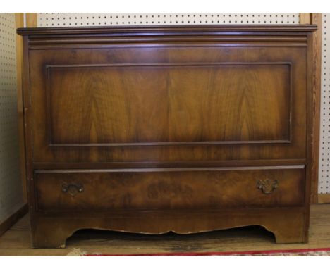 A Georgian-style mahogany blanket box or coffer with hinged lift-up lid, drawer under with brass drop handle and carved back 