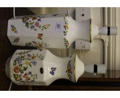Two hexagonal Aynsley lamp stands in the cottage garden range, multicoloured floral designs, fitted for electricity 