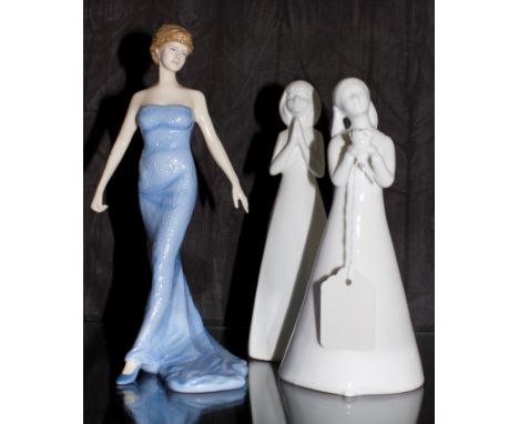 A Royal Doulton ceramic figurine of Diana, Princess of Wales, 23cm high and two Royal Doulton glazed figurines, 'Happy Birthd