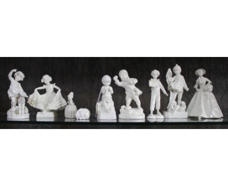 A selection of unpainted and unmarked Royal Worcester figurines of young boys, girls, ladies, etc (9)
