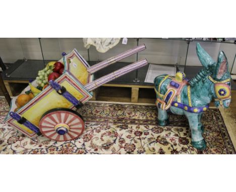 A multicoloured novelty ceramic Continental-style donkey and cart