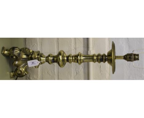 A Victorian style brass lamp stand with central turned column on tripod feet, 53cm high