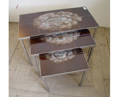 Retro nest of three chromed tables with tile tops 