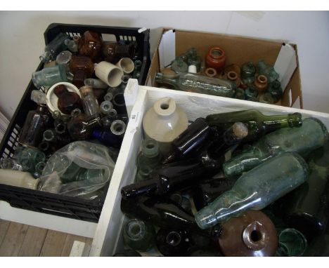 Three boxes containing large selection of various vintage glass and stoneware bottles 
