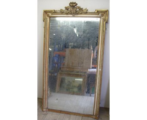 Large 19th C gilt framed console mirror with plasterwork crested top (104cm x 180cm) 
