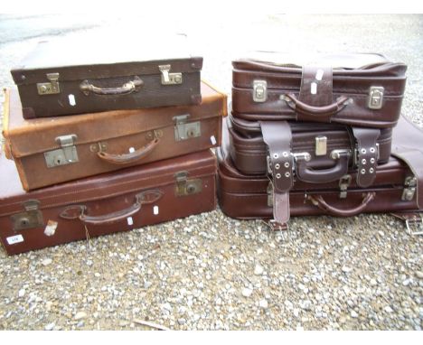 Vintage brown leather suitcase, another similar and a small selection of other later luggage 