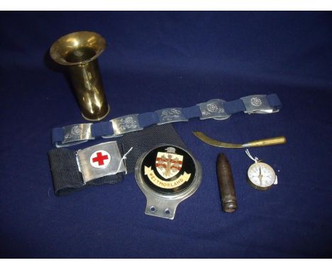 Trench art vase formed from a 2PDR shell casing, similar paperknife, a small pocket compass marked Made in France, inert shel