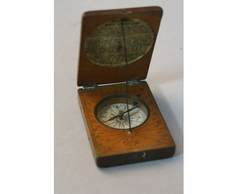 A MINIATURE COMPASS AND SUNDIAL, in a wooden case