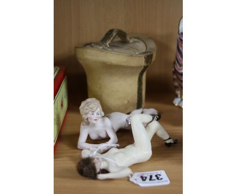 TWO CERAMIC NUDE FEMALE FIGURES, and a novelty tobacco jar shaped as leather hat box (all with some damage) (3)