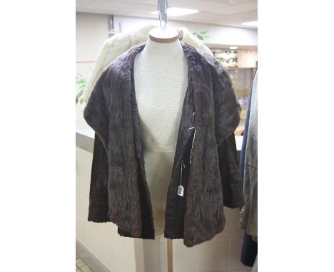 A PONY SKIN COAT, child's ermine cape, another cape and a squirrel shawl (4)