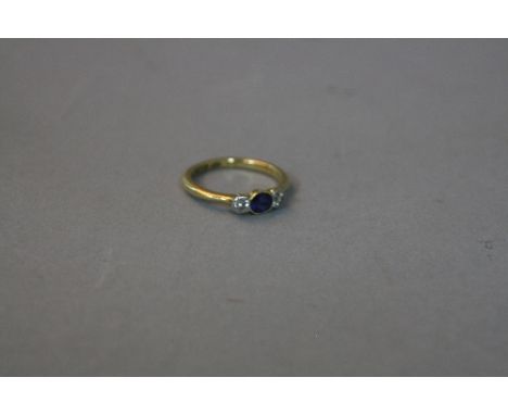AN 18CT SAPPHIRE AND DIAMOND RING, ring size I, approximate weight 2.6 grams