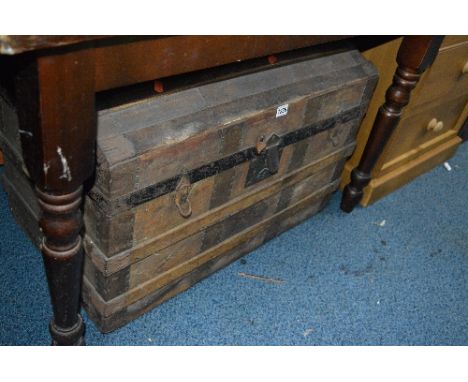 A DOMED TOPPED TRUNK, with metal banding (sd)