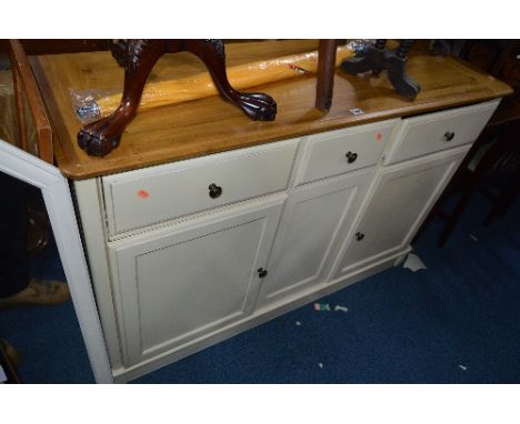 A MODERN PAINTED SIDEBOARD, with light oak top and three short drawers, approximate size width 137cm x height 90cm x depth 45