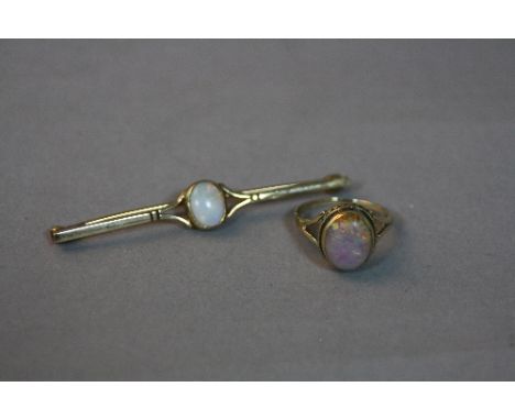 A 9CT OPAL RING, ring size H and a 9ct opal bar brooch (2)