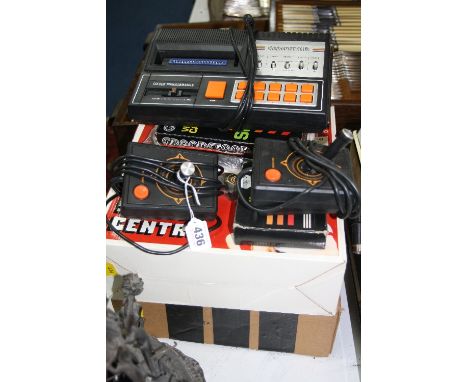 A VINTAGE GRANDSTAND VIDEO GAMING CONSOLE, in its original box and outer with three games, Submarine, Supersportic and Car Ra