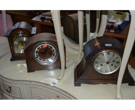 A MODERN TEMPUS FUGIT MANTLE CLOCK AND TWO OAK MANTLE CLOCKS (3)