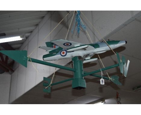A MODERN PAINTED WEATHER VANE, with a revolving fighter jet attached above