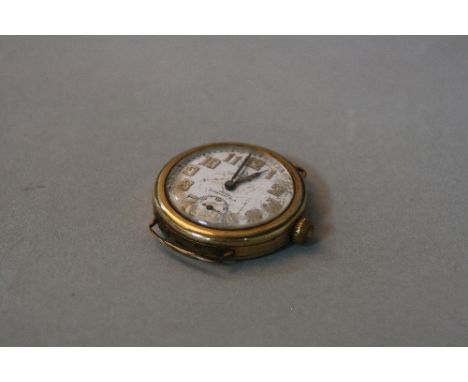 AN OMEGA WATCH HEAD, marked on white enamel face Yates Chesterfield