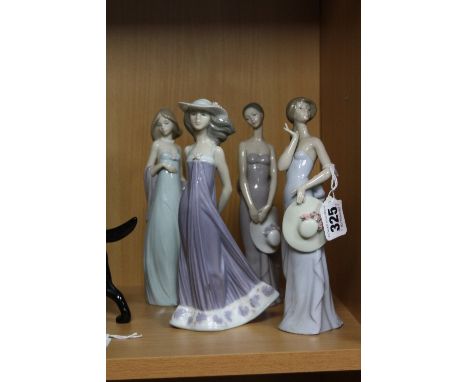 FOUR LLADRO FIGURINES, 'Coquette' No.5599, 'Bridesmaid' No.5598, 'Susan' No.5644 and another in evening dress, shawl and bag 