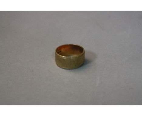 A 9CT BAND, ring size N, approximate weight 5.5 grams