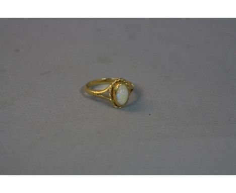 AN 18CT OPAL RING, ring size M, approximate weight 3.4 grams