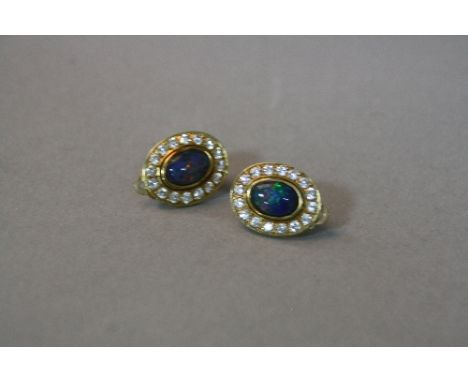 A PAIR OF 10CT OPAL CLIP EARRINGS, approximate weight 5.6 grams