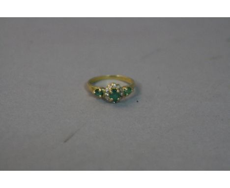 AN 18CT EMERALD AND DIAMOND RING, ring size J, approximate weight 3.1 grams