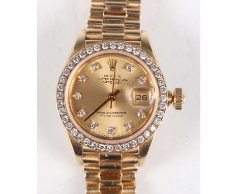 A Rolex Oyster Perpetual Datejust 18K gold and diamond set lady's bracelet wristwatch, Ref. 69178, circa 1987, with signed an