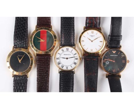 A Tiffany &amp; Co gold circular cased gentleman's wristwatch with quartz movement, the signed white dial with black Roman ho