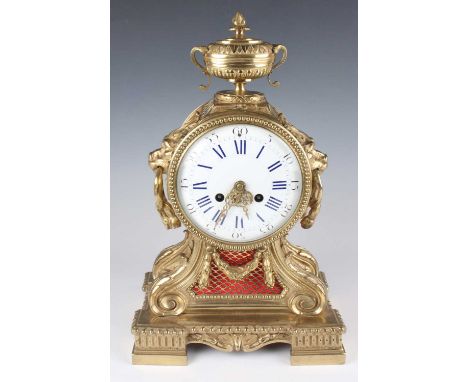 A mid-19th century French gilt brass mantel clock with eight day movement striking on a bell via an outside countwheel, the w
