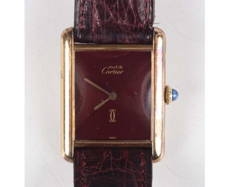 A Must de Cartier Tank silver gilt rectangular cased gentleman's wristwatch with manual movement, the signed burgundy dial wi