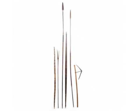 New Guinea self bow with decoration L144cm, a European bow, possibly Lapland, African spears and an axe